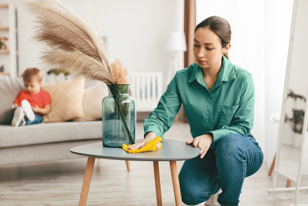How can I quickly clean up sticky spills from juice or snacks