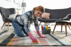 How do you clean a large area rug on hardwood floors