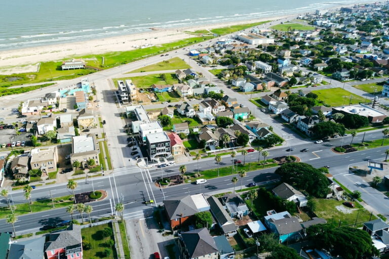 Why do homes near busy streets collect dust faster